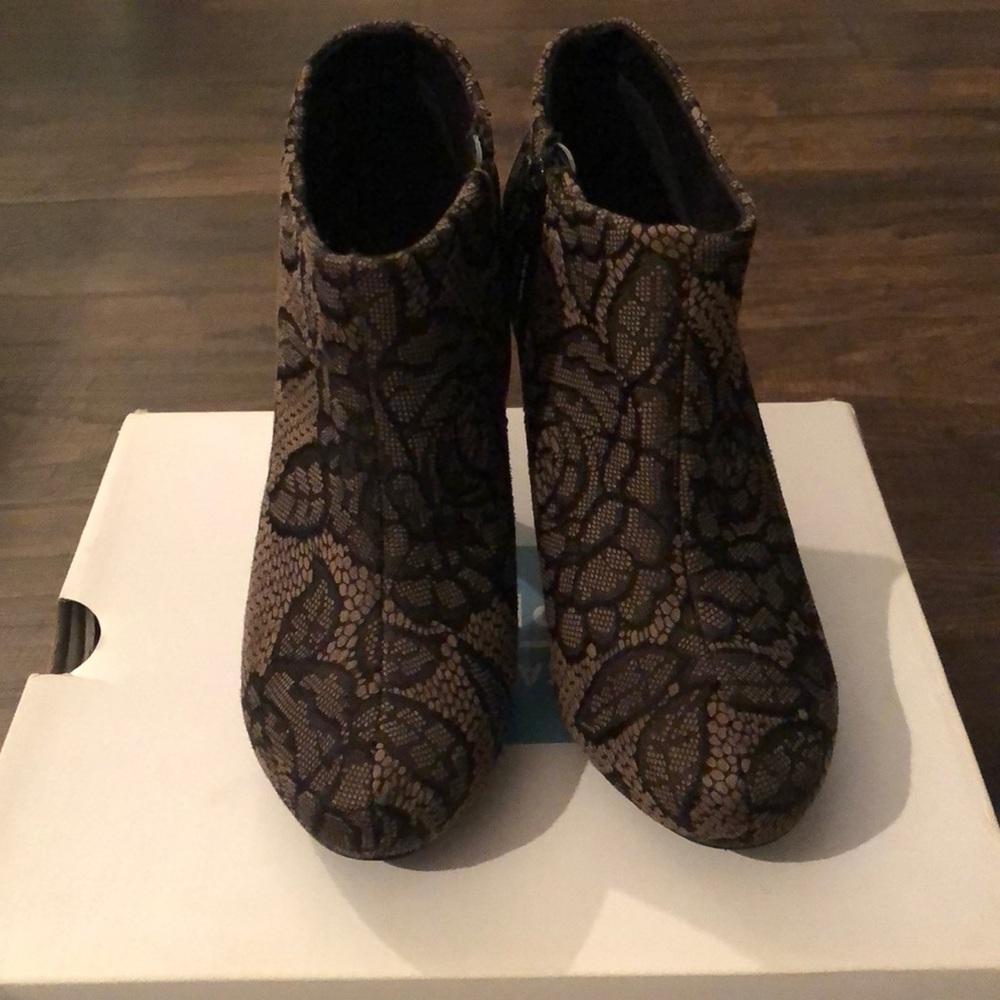 Pruss Call It Spring Boots. Floral designs.